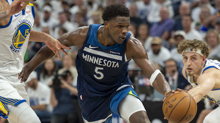 May 8, 2025; Minneapolis, Minnesota, USA; Minnesota Timberwolves guard Anthony Edwards (5) drives to the basket against the Golden State Warriors in the first half during game two of the second round for the 2025 NBA Playoffs at Target Center. Mandatory Credit: Jesse Johnson-Imagn Images