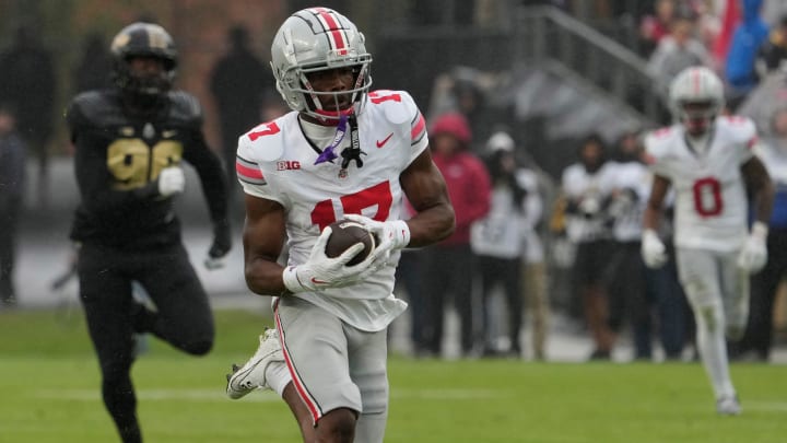 Oct. 14, 2023; Lafayette, In., USA; 
Ohio State Buckeyes wide receiver Carnell Tate (17) catches a long pass to set up a touchdown during the second half of Saturday's NCAA Division I football game against the Purdue Boilermakers at Ross-Ade Stadium in Lafayette.