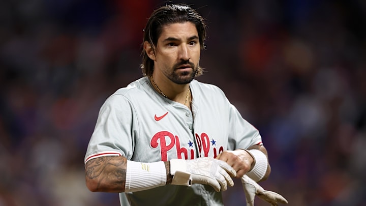 Oct 8, 2024; New York City, New York, USA; Philadelphia Phillies outfielder Nick Castellanos (8) reacts in the eighth inning against the New York Mets during game three of the NLDS for the 2024 MLB Playoffs at Citi Field.