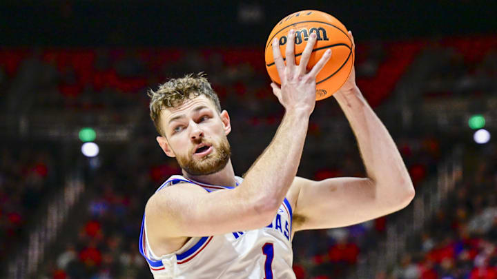 Feb 15, 2025; Salt Lake City, Utah, USA; Kansas Jayhawks center Hunter Dickinson (1) recovers a rebound against the Utah Utes during the second half at the Jon M. Huntsman Center.