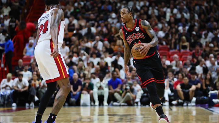 Apr 19, 2024; Miami, Florida, USA; Chicago Bulls forward DeMar DeRozan (11) dribbles the basketball.