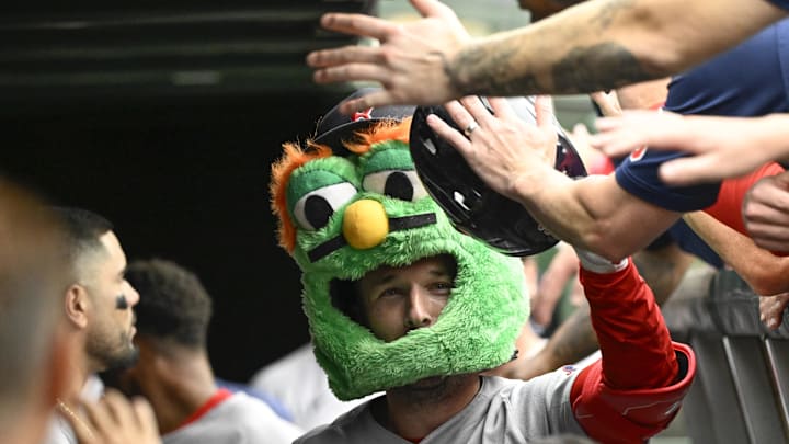 Jul 20, 2025; Chicago, Illinois, USA;  Boston Red Sox third baseman Alex Bregman (2) celebrates int he dugout after he hit a three run home run against the Chicago Cubs during the eighth inning at Wrigley Field. Mandatory Credit: Matt Marton-Imagn Images