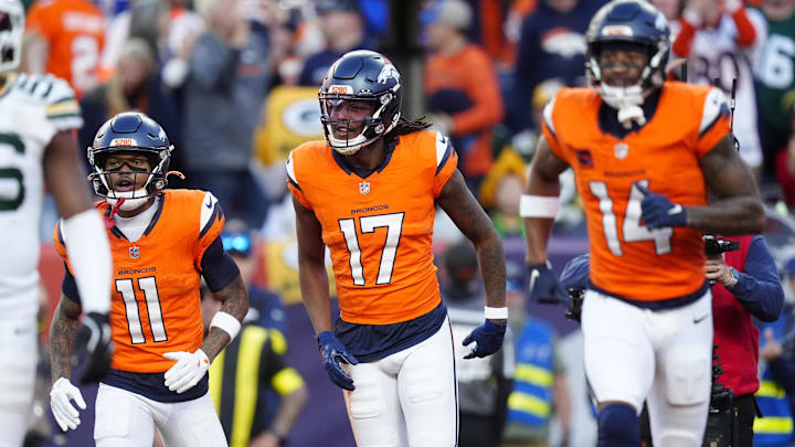 Dec 14, 2025; Denver, Colorado, USA; Denver Broncos wide receiver Lil'Jordan Humphrey (17) celebrates a touchdown with wide receiver Troy Franklin (11) and wide receiver Courtland Sutton (14) during the second quarter against the Green Bay Packers at Empower Field at Mile High. Mandatory Credit: Ron Chenoy-Imagn Images Dec 14, 2025; Denver, Colorado, USA; Denver Broncos wide receiver Lil'Jordan Humphrey (17) celebrates a touchdown with wide receiver Troy Franklin (11) and wide receiver Courtland Sutton (14) during the second quarter against the Green Bay Packers at Empower Field at Mile High. Mandatory Credit: Ron Chenoy-Imagn Images