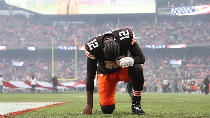 Dec 28, 2025; Cleveland, Ohio, USA; Cleveland Browns quarterback Shedeur Sanders (12) kneels before the game against the Pittsburgh Steelers at Huntington Bank Field. Mandatory Credit: Scott Galvin-Imagn Images