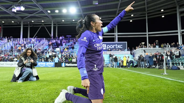 Nov 23, 2024; Kansas City, Missouri, USA;   Orlando Pride forward Marta (10) celebrates after defeating the Washington Spirit in the 2024 NWSL Championship match at CPKC Stadium. Mandatory Credit: Jay Biggerstaff-Imagn Images