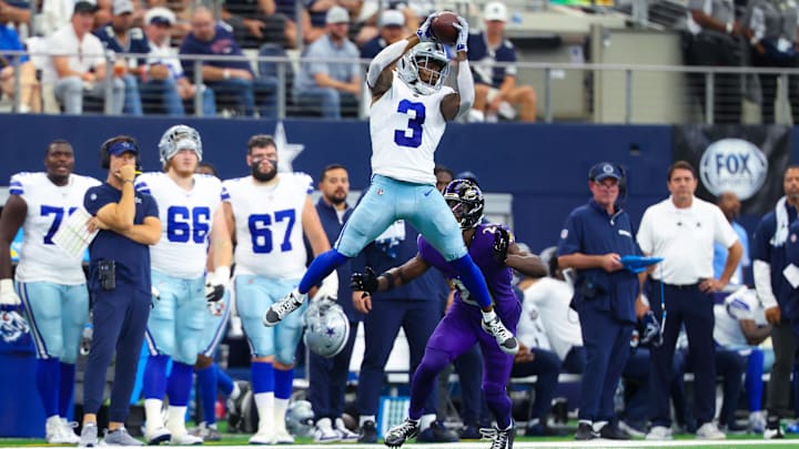 Sep 22, 2024; Arlington, Texas, USA;  Dallas Cowboys wide receiver Brandin Cooks (3) makes a catch in fron tof Baltimore Ravens cornerback Brandon Stephens (21) during the first half at AT&T Stadium. Mandatory Credit: Kevin Jairaj-Imagn Images
