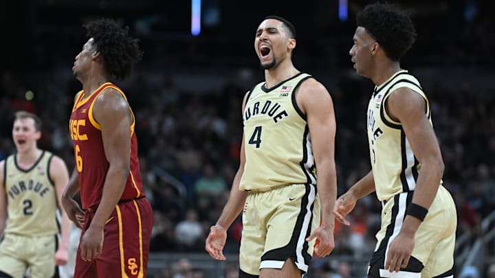 Purdue Boilermakers forward Trey Kaufman-Renn (4) celebrates after a play during the first half against the USC Trojans Purdue Boilermakers forward Trey Kaufman-Renn (4) celebrates after a play during the first half against the USC Trojans