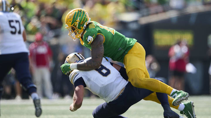 Aug 30, 2025; Eugene, Oregon, USA; Oregon Ducks linebacker Matayo Uiagalelei (10) sacks Montana State Bobcats quarterback Justin Lamson (8) during the second half at Autzen Stadium. Mandatory Credit: Troy Wayrynen-Imagn Images