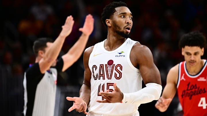 Nov 23, 2025; Cleveland, Ohio, USA; Cleveland Cavaliers guard Donovan Mitchell (45) celebrates after hitting a three point basket against the Los Angeles Clippers during the second half at Rocket Arena. Mandatory Credit: Ken Blaze-Imagn Images