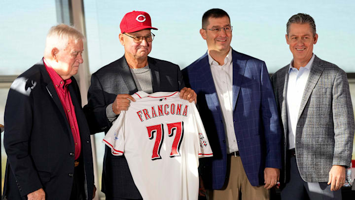 New Cincinnat Reds manager Terry Francona holds his new jersey on stage with (left to right) team owner Bob Castellini, President of Baseball Operation, Nick Krall, and General Manager Brad Meador, during an event to introduce the new manager of the Cincinnati Reds at Great American Ball Park in downtown Cincinnati on Monday, Oct. 7, 2024. New Cincinnat Reds manager Terry Francona holds his new jersey on stage with (left to right) team owner Bob Castellini, President of Baseball Operation, Nick Krall, and General Manager Brad Meador, during an event to introduce the new manager of the Cincinnati Reds at Great American Ball Park in downtown Cincinnati on Monday, Oct. 7, 2024.