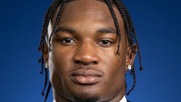 NCAA Football Michigan quarterback Alex Orji