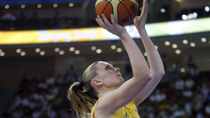 Aug 13, 2008; Beijing, CHINA; Australia forward Penny Taylor (7) shoots as Korea guard Younah Choi (6) watches during the second half of a preliminary round game at the Olympic Basketball Gymnasium during the 2008 Beijing Olympic Games. Mandatory Credit: Jerry Lai-Imagn Images