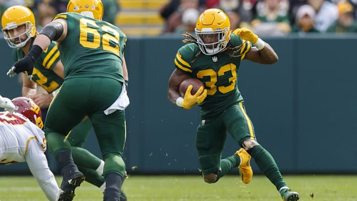 Oct 24, 2021; Green Bay, Wisconsin, USA;  Green Bay Packers running back Aaron Jones (33) rushes