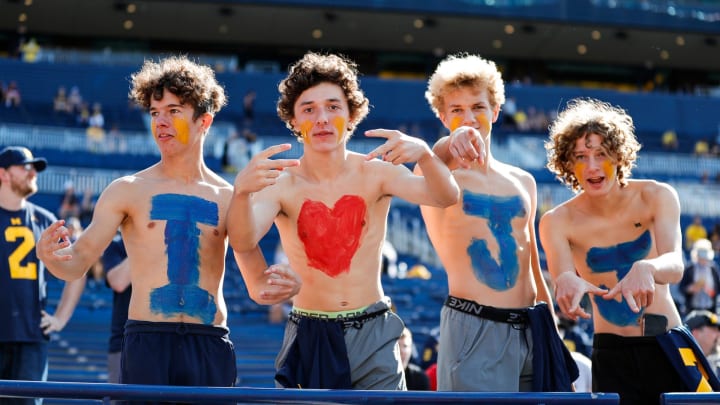 Michigan fans with "I heart JJ" body paint watch warmups before a game against Northern Illinois at Michigan Stadium in Ann Arbor on Saturday, Sept. 18, 2021. USA Today Michigan fans with "I heart JJ" body paint watch warmups before a game against Northern Illinois at Michigan Stadium in Ann Arbor on Saturday, Sept. 18, 2021. USA Today