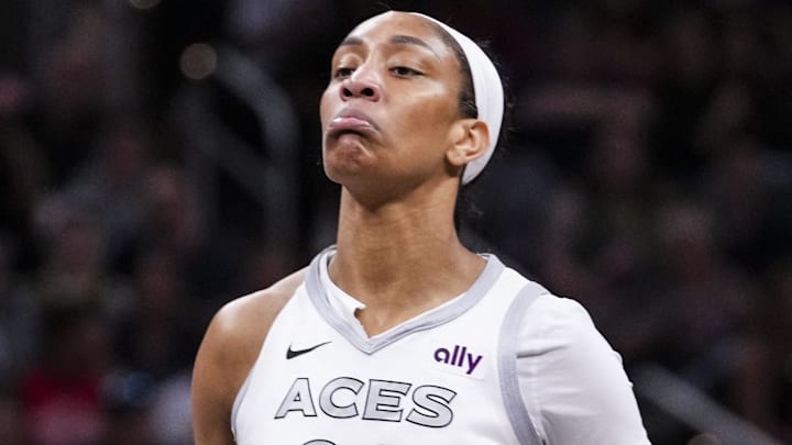 Sep 11, 2024; Indianapolis, Indiana, USA; Las Vegas Aces center A'ja Wilson (22) reacts after scoring Wednesday, Sept. 11, 2024, during a game between the Indiana Fever and the Las Vegas Aces at Gainbridge Fieldhouse in Indianapolis.  Mandatory Credit: Grace Smith