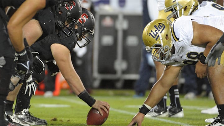 November 30, 2012; Stanford, CA, USA; Stanford Cardinal prepares to snap the ball at the line of scrimmage against the UCLA Bruins during the first quarter of the Pac-12 Championship game at Stanford Stadium. Mandatory Credit: Kirby Lee/Image of Sport-Imagn Images