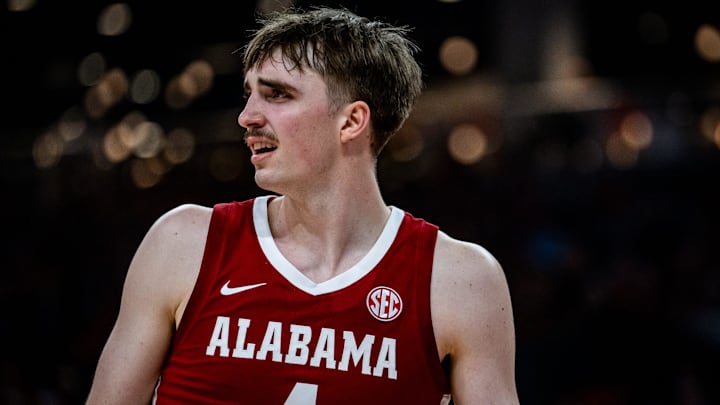 Alabama Crimson Tide forward Grant Nelson (4) questions a call by the referees in the first half as the Texas Longhorns take on the Crimson Tide at the Moody Center, Feb. 11, 2025.
