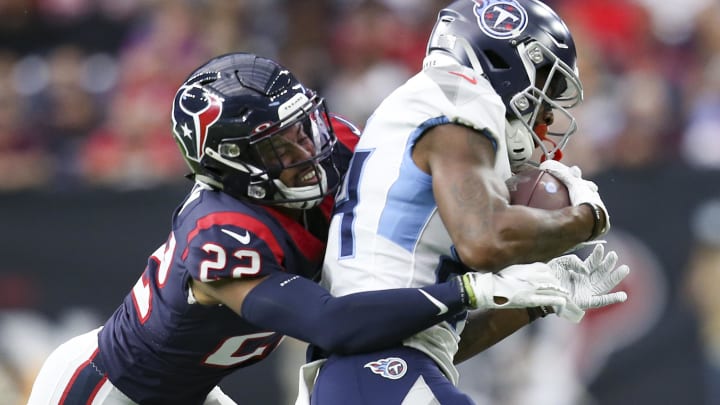 Dec 29, 2019; Houston, Texas, USA; Tennessee Titans wide receiver Corey Davis (84) makes a catch against Houston Texans cornerback Gareon Conley (22) in the first quarter at NRG Stadium. Dec 29, 2019; Houston, Texas, USA; Tennessee Titans wide receiver Corey Davis (84) makes a catch against Houston Texans cornerback Gareon Conley (22) in the first quarter at NRG Stadium.