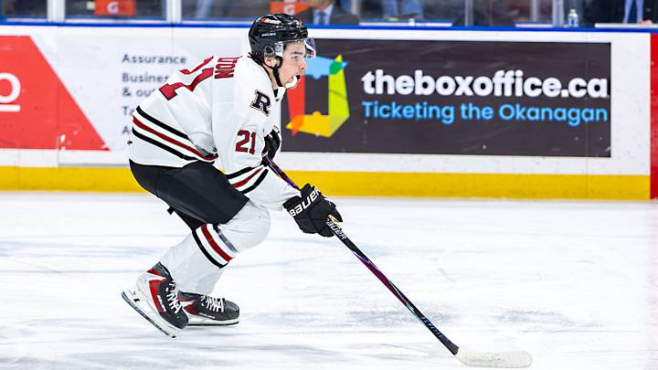 KELOWNA, BRITISH COLUMBIA - JANUARY 27: Beckett Hamilton #21 of the Red Deer Rebels carries the puck against the Kelowna Rockets at Prospera Place on January 27, 2026 in Kelowna, British Columbia. (Photo by Steve Dunsmoor/Getty Images)