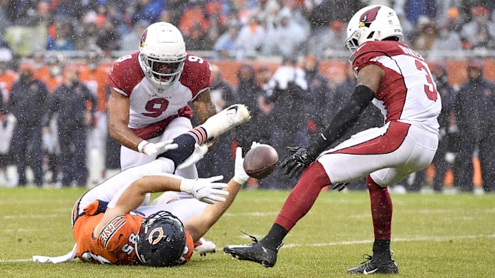 Cole Kmet coughs up the ball for an interception in a Bears loss at home against the Cardinals in 2021. Cole Kmet coughs up the ball for an interception in a Bears loss at home against the Cardinals in 2021.