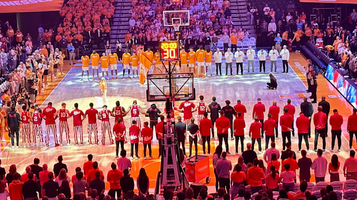 Indiana and Tennessee take the court for the national anthem before  their Sunday exhibition game.