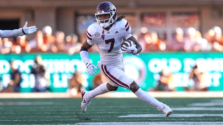 Sep 28, 2024; Austin, Texas, USA; Mississippi State Bulldogs wide receiver Mario Craver (7) runs the ball in the second half against the Texas Longhorns at Darrell K Royal-Texas Memorial Stadium.