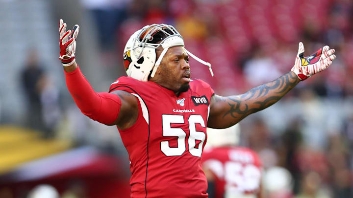 Dec 1, 2019; Glendale, AZ, USA; Arizona Cardinals linebacker Terrell Suggs gestures towards the Los Angeles Rams players during warmups prior to the game at State Farm Stadium. Mandatory Credit: Mark J. Rebilas-Imagn Images