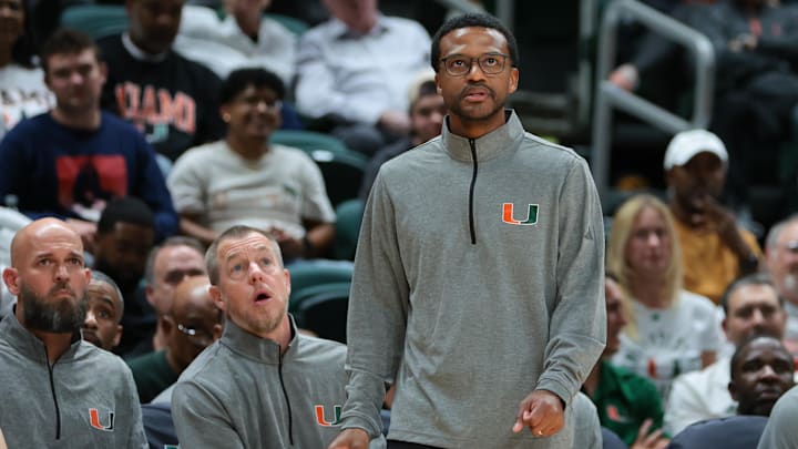 Nov 3, 2025; Coral Gables, Florida, USA; Miami Hurricanes head coach Jai Lucas looks on against the Jacksonville Dolphins during the second half at Watsco Center. Mandatory Credit: Sam Navarro-Imagn Images