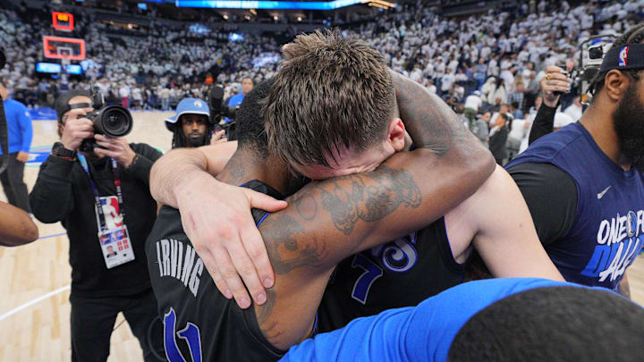Irving and Doncic celebrate after defeating the Minnesota Timberwolves in the 2024 NBA Playoffs. 