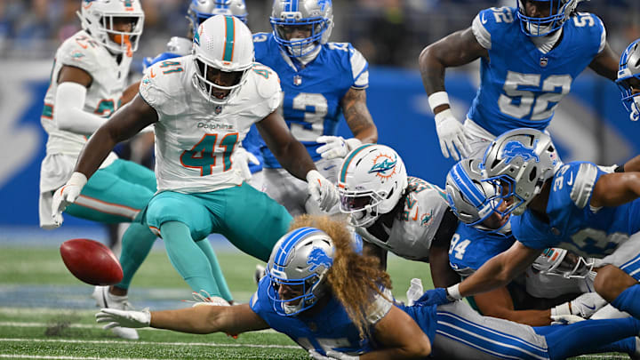 Miami Dolphins LB Channing Tindall (41) recovers this Dee Eskridge fumble on a punt return during the preseason game against the Detroit Lions at Ford Field. Miami Dolphins LB Channing Tindall (41) recovers this Dee Eskridge fumble on a punt return during the preseason game against the Detroit Lions at Ford Field.