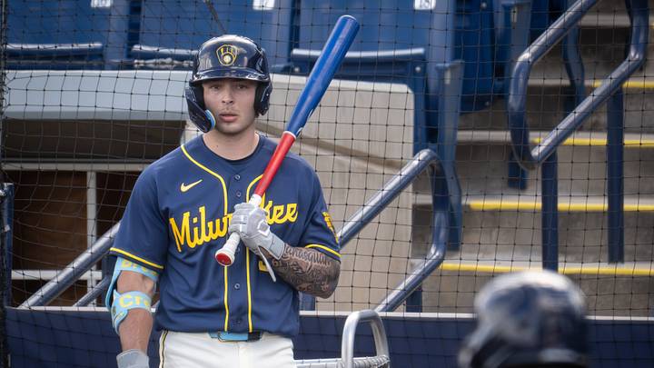 Milwaukee Brewers infield prospect Andrew Fischer waits to bat during spring training workouts Tuesday, February 17, 2026, at American Family Fields of Phoenix in Phoenix, Arizona. Milwaukee Brewers infield prospect Andrew Fischer waits to bat during spring training workouts Tuesday, February 17, 2026, at American Family Fields of Phoenix in Phoenix, Arizona.