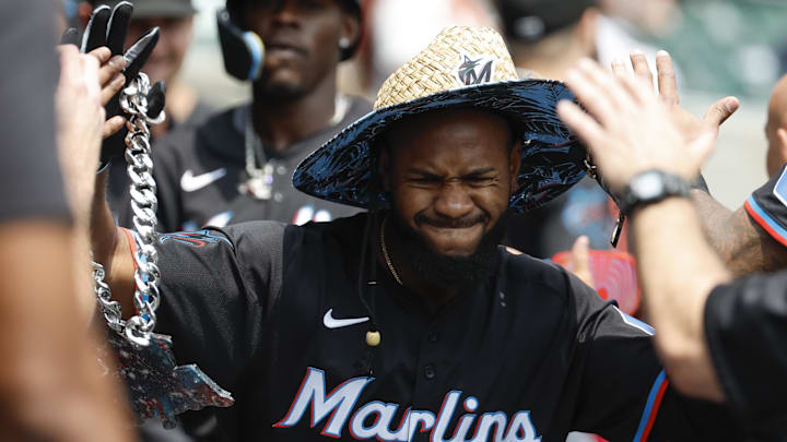May 15, 2024; Detroit, Michigan, USA;  Miami Marlins outfielder Bryan De La Cruz (14) receives congratulations from teammates after he hits a two-run home run in the first inning against the Detroit Tigers at Comerica Park.
