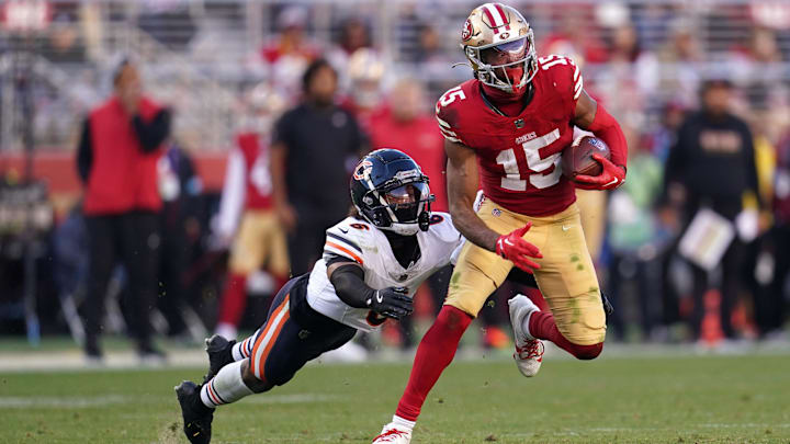 49ers wide receiver Jauan Jennings tries to elude Kyler Gordon in last year's Bears road loss.
