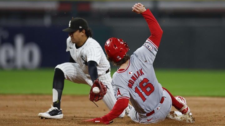 Sep 24, 2024; Chicago, Illinois, USA; Los Angeles Angels outfielder Mickey Moniak (16) steals second base against Chicago White Sox second baseman Nicky Lopez (8) during the fifth inning at Guaranteed Rate Field.