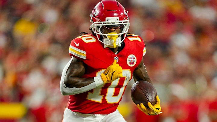 Aug 22, 2025; Kansas City, Missouri, USA; Kansas City Chiefs running back Isiah Pacheco (10) runs the ball during the first half against the Chicago Bears at GEHA Field at Arrowhead Stadium.