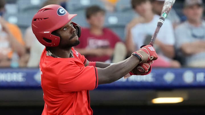 May 21, 2025; Hoover, AL, USA; Georgia left fielder Tre Phelps (1) follows through as he connects with a pitch during the game with Oklahoma in the second round of the SEC Baseball Tournament at the Hoover Met.