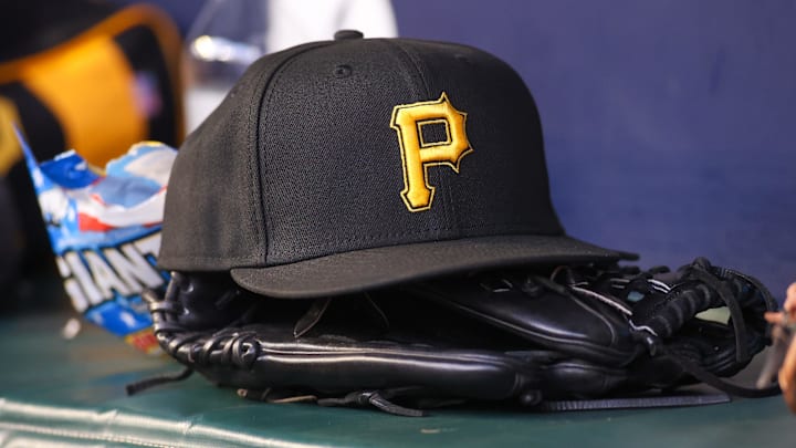 Sep 8, 2023; Atlanta, Georgia, USA; A detailed view of a Pittsburgh Pirates hat and glove before a game against the Pittsburgh Pirates in the first inning at Truist Park. Mandatory Credit: Brett Davis-Imagn Images Sep 8, 2023; Atlanta, Georgia, USA; A detailed view of a Pittsburgh Pirates hat and glove before a game against the Pittsburgh Pirates in the first inning at Truist Park. Mandatory Credit: Brett Davis-Imagn Images