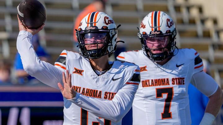 Oklahoma State quarterback Garret Rangel (13) warms up before an NCAA football game between Oklahoma State and Tulsa in Tulsa, Okla., on Saturday, Sept. 14, 2024.
