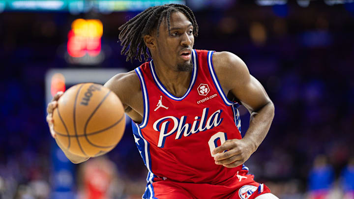 Apr 12, 2024; Philadelphia, Pennsylvania, USA; Philadelphia 76ers guard Tyrese Maxey (0) controls the ball against the Orlando Magic during the third quarter at Wells Fargo Center. Mandatory Credit: Bill Streicher-Imagn Images