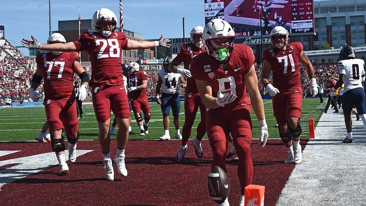Washington State Cougars running back Kirby Vorhees (9) celebrate a touchdown against the Duquesne Dukes during the first half at Gesa Field at Martin Stadium. 