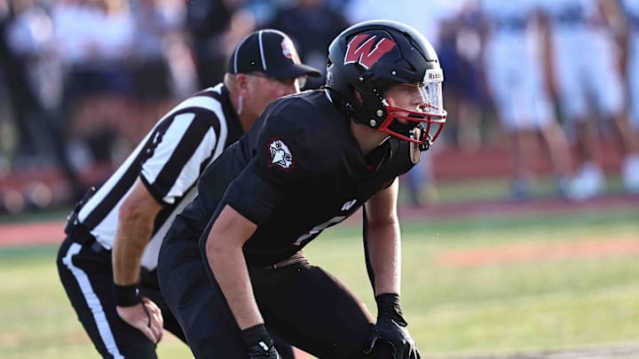 Lakota West linebacker Grant Beerman (1) sets up during the Firebirds' 17-13 win over St. Xavier Friday, Aug. 23, 2024.