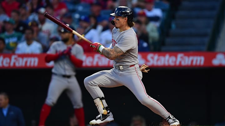Jun 23, 2025; Anaheim, California, USA; Boston Red Sox left fielder Jarren Duran (16) hits a double against the Los Angeles Angels during the fifth inning at Angel Stadium. 