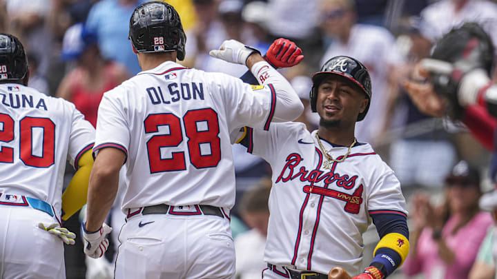 Apr 20, 2025; Cumberland, Georgia, USA; Atlanta Braves first baseman Matt Olson (28) reacts with second baseman Ozzie Albies (1) after hitting a two run home run against the Minnesota Twins during the first inning at Truist Park. Apr 20, 2025; Cumberland, Georgia, USA; Atlanta Braves first baseman Matt Olson (28) reacts with second baseman Ozzie Albies (1) after hitting a two run home run against the Minnesota Twins during the first inning at Truist Park.