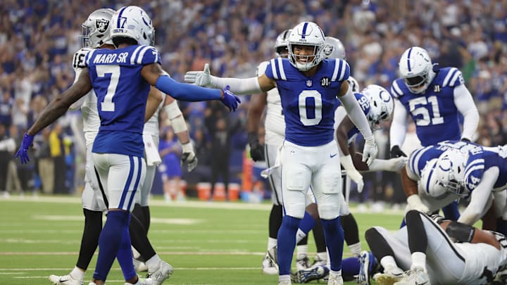 Oct 5, 2025; Indianapolis, Indiana, USA; Indianapolis Colts safety Cam Bynum (0) high fives cornerback Charvarius Ward (7) after an interception against the Las Vegas Raiders during the second quarter at Lucas Oil Stadium. Mandatory Credit: Trevor Ruszkowski-Imagn Images