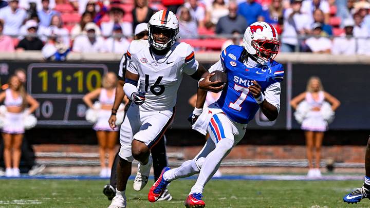Oct 17, 2026; Dallas, Texas, USA; Virginia Cavaliers defensive end Matthew Fobbs-White (16) and SMU Mustangs quarterback Kevin Jennings (7) in action during the game between the Mustangs and the Cavaliers at Gerald J. Ford Stadium. Mandatory Credit: Jerome Miron-Imagn Images Oct 17, 2026; Dallas, Texas, USA; Virginia Cavaliers defensive end Matthew Fobbs-White (16) and SMU Mustangs quarterback Kevin Jennings (7) in action during the game between the Mustangs and the Cavaliers at Gerald J. Ford Stadium. Mandatory Credit: Jerome Miron-Imagn Images