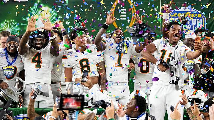 The Miami Hurricanes celebrate following the Cotton Bowl at AT&T Stadium in Arlington, Texas for the College Football Playoff quarterfinal game against the Ohio State Buckeyes on Dec. 31, 2025. Ohio State lost 24-14.