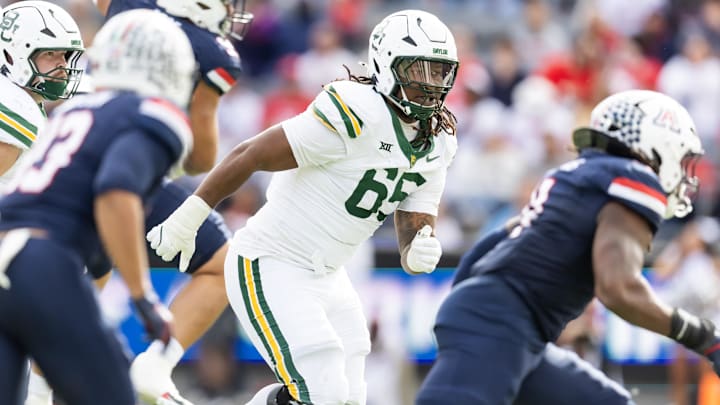 Nov 22, 2025; Tucson, Arizona, USA; Baylor Bears offensive lineman Sean Thompkins (65) against the Arizona Wildcats at Casino Del Sol Stadium. Mandatory Credit: Mark J. Rebilas-Imagn Images