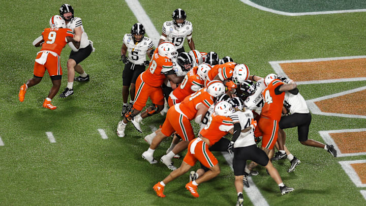 Dec 28, 2024; Orlando, FL, USA; Miami Hurricanes running back Mark Fletcher Jr. (4) scores a touchdown against the Iowa State Cyclones in the third quarter during the Pop Tarts bowl at Camping World Stadium. Mandatory Credit: Nathan Ray Seebeck-Imagn Images Dec 28, 2024; Orlando, FL, USA; Miami Hurricanes running back Mark Fletcher Jr. (4) scores a touchdown against the Iowa State Cyclones in the third quarter during the Pop Tarts bowl at Camping World Stadium. Mandatory Credit: Nathan Ray Seebeck-Imagn Images