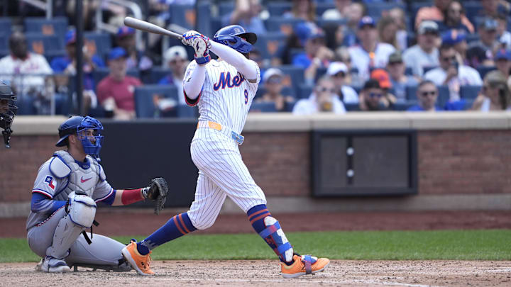 Sep 14, 2025; New York City, New York, USA;  New York Mets left fielder Brandon Nimmo (9) hits a home run against the Texas Rangers during the sixth inning at Citi Field. Mandatory Credit: Gregory Fisher-Imagn Images
