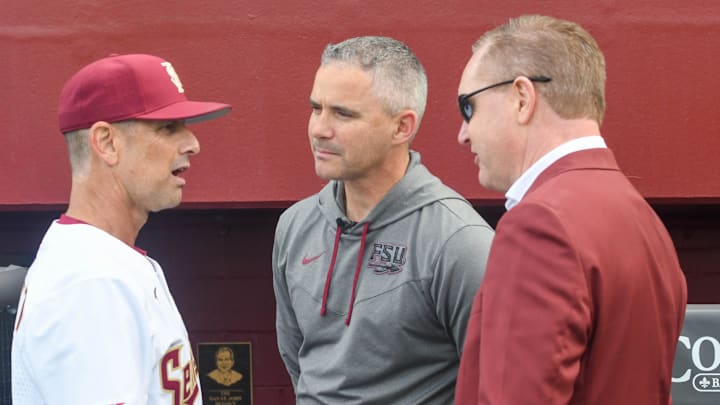 Florida State vice president and athletics director Michael Alford (right), football head coach Mike Norvell (middle) and baseball head coach Link Jarrett talk pregame during opening day against James Madison on Feb. 17, 2023, at Dick Howser Stadium.

Fsujmubaseball1 1 Of 1